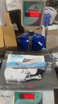 Thumbnail for Handheld Sewing Machine